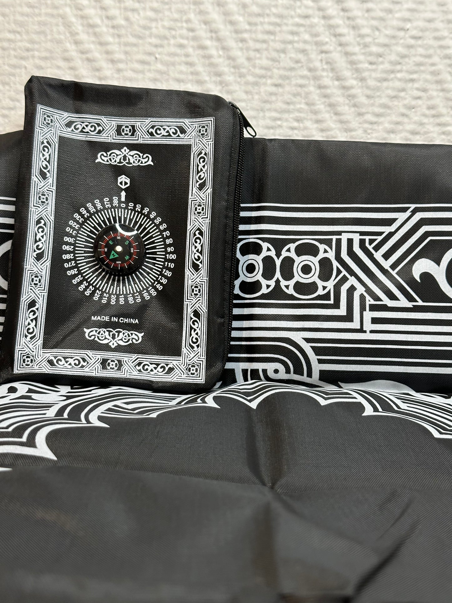 Tapis d’extérieur avec boussole